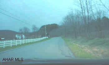 NIce 12 Acre +/- parcel of land located approximately 0.5 mile up Scrubgrass Road on Right.  Property is a part of a 30 Acres tract that upon a wrtiien and accepted contract, seller agrees to have property subdivided.  Nice beautiful country setting for a new home!  Owner will subdivide property upon approval of a written offer.  The property does not contain a well or a septic.  Property consists of approximately 12 Acres +/-.  Must See!