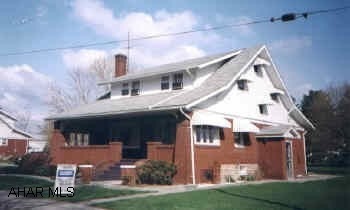GREAT PROPERTY. WELL MAINTAINED 2 STORY HOUSE PLUS 9 GARAGES & 2.04 ACRES. BEAUTIFUL SETTING. NEVER USED FURNACE.