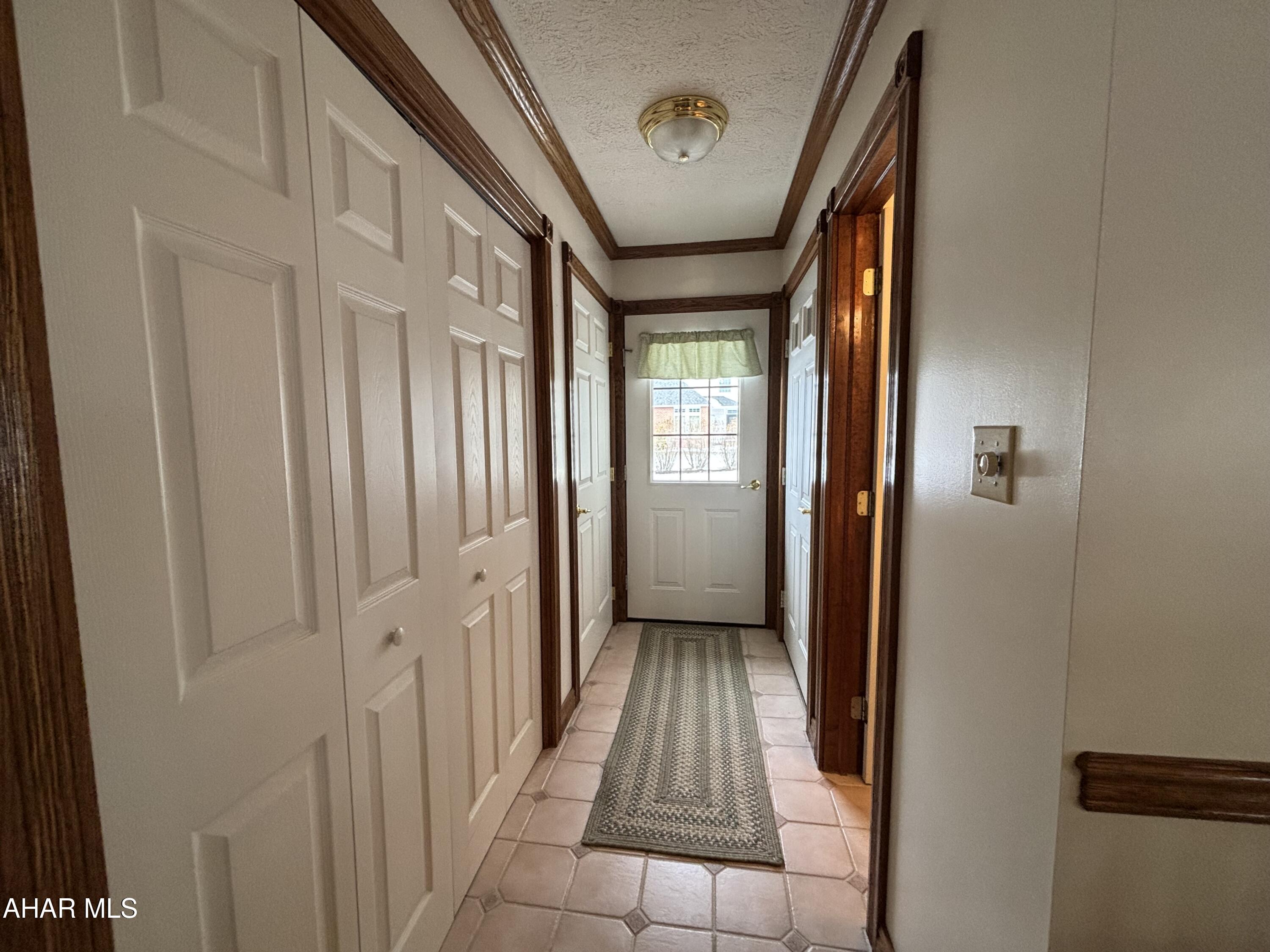 Beautiful custom built home, on 1.48 acres in Martinsburg.  This 4 BR , 5 Bath home is graced with hardwood floors. Check out the amazing floor plan, wrap around porch, tons of storage, a first floor primary bedroom and laundry, 2 fireplaces, Gas stove in the sun room, a study with build ins, ceramic tile in kitchen and baths, oak cabinetry and corian counters,.  More descriptions on the pictures.