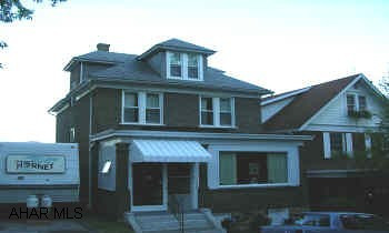 CHARMING HOME METICULOUSLY MAINTAINED.  HARDWOOD FLOORS.  ENCLOSED PORCH.  LOVELY VIEW FROM PORCH.  ALL BRICK, FINISHED THIRD FLOOR, POWDER ROOM ON 1ST FLR, OFF STREET PARKING.