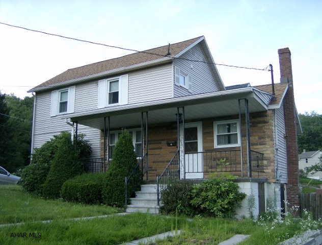 Forest Hills schools- South Fork area- 2 BR, 1 bath stone & aluminum sided house on a 50 x 50 corner lot. Large eat-in kitchen, appliances included. Oil forced air heat. $34,900