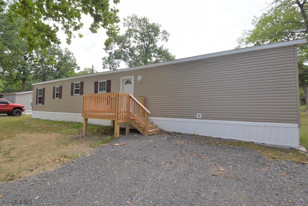 Super nice brand new singlewide mobile home on rented lot in Hillcrest Estates in Greenwood.  Affordable living in a community with treed lots.  Seller incentive offers the first month and sixth month of lot rent for free.  Home comes with a one and a half year warranty.     Lot rent $325.00 includes water, sewer, and trash removal.