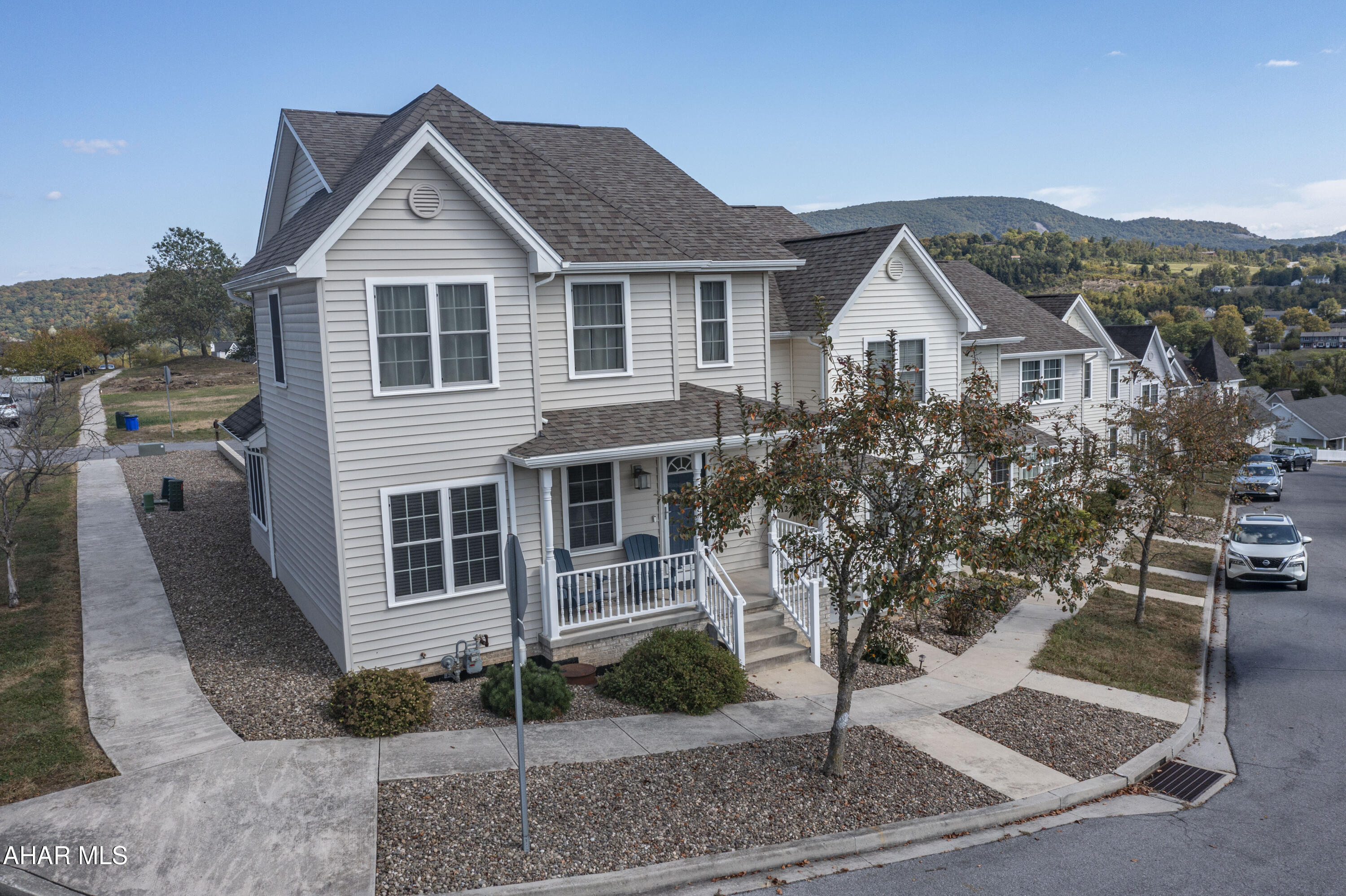 Welcome to 614 Baldwin Lane, a meticulously-kept modern industrial style townhouse built in 2018, in the desirable Holliday Hills neighborhood. As an end unit, this 3 bedroom, 2.5 bath home provides extra privacy, natural light, and views from the top of the hill of this wonderful, quiet community. 

The 1st floor features a spacious eat-in kitchen with walk-in pantry, with walkout access to a large deck perfect for relaxing or entertaining guests. The kitchen flows easily into a large dining room which is open to the family room for that perfect open-concept living you have been searching for. There is an office space off the living room with a nice view out the front window of the home. There's also a powder room conveniently located on the 1st floor for visiting guests. 

The 2nd floor features a spacious primary bedroom with primary bathroom & walk-in closet. The 2nd bedroom also features a large walk-in closet. On this floor, there is another full bathroom for the 2nd and 3rd bedrooms & the TVs in both of those bedrooms are included in the sale! Plenty of storage on this floor with 3 large closets in the hallway.
 
Additional features of this property that are worth noting include: whole home security system (all windows, motion detection, front porch and back deck video cameras), hardwired smoke detectors, in-home sprinkler system, laundry chute on the first & second floor, ample closet & storage space throughout to keep everything organized.

It is conveniently located within short distance to Penn Mont Academy, Creative Kids Education Center, and within the desirable Hollidaysburg Area School District. 

This low-maintenance, gorgeous, move-in ready townhome is ready for you to move right in!