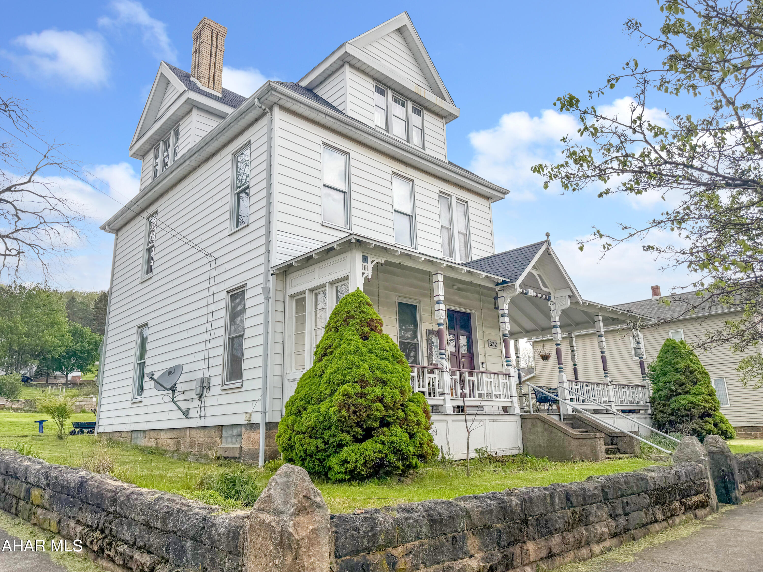 Welcome to 332 Beaver Street in the Hastings Borough - a rare opportunity to own a home with uniqueness. Built in 1891, this stunning Victorian-style home sits proudly on a large corner lot and is filled with timeless character, intricate craftsmanship, and endless potential to be restored to its original grandeur. From the moment you step inside, you'll appreciate the beautiful original woodwork, soaring ceilings, hardwood floors, oversized rooms, and the kind of architectural detail that simply cannot be replicated today. The main floor features a grand foyer, spacious family room with an ornate fireplace, formal dining room with a matching fireplace, large living room with built-in shelving, full bathroom, and a convenient laundry area. The fully remodeled kitchen blends modern updates with historic charm and includes custom cabinetry, granite countertops, and ample space for entertaining. A classic butler door and second staircase - once used as a servant's entrance - further add to the home's historic appeal and unique character. The second floor offers 5 spacious bedrooms and a full bathroom, while the partially finished attic provides incredible additional space with endless possibilities for future living areas, office space, or recreation. The basement is unfinished but offers excellent storage and houses the mechanicals. Outside, enjoy the gorgeous covered wrap-around porch, detached 2-car garage, and spacious corner lot that perfectly complement this stately home. While the property does need TLC, the bones, craftsmanship, and charm are already here making this a truly special opportunity for someone looking to bring a historic Victorian back to life. Call today! Property is being sold ''AS-IS''.