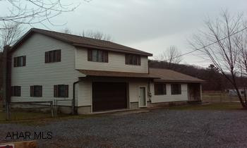 Very nice home on 1 +/- acre lot completely fenced. Pavilion with above ground pool.