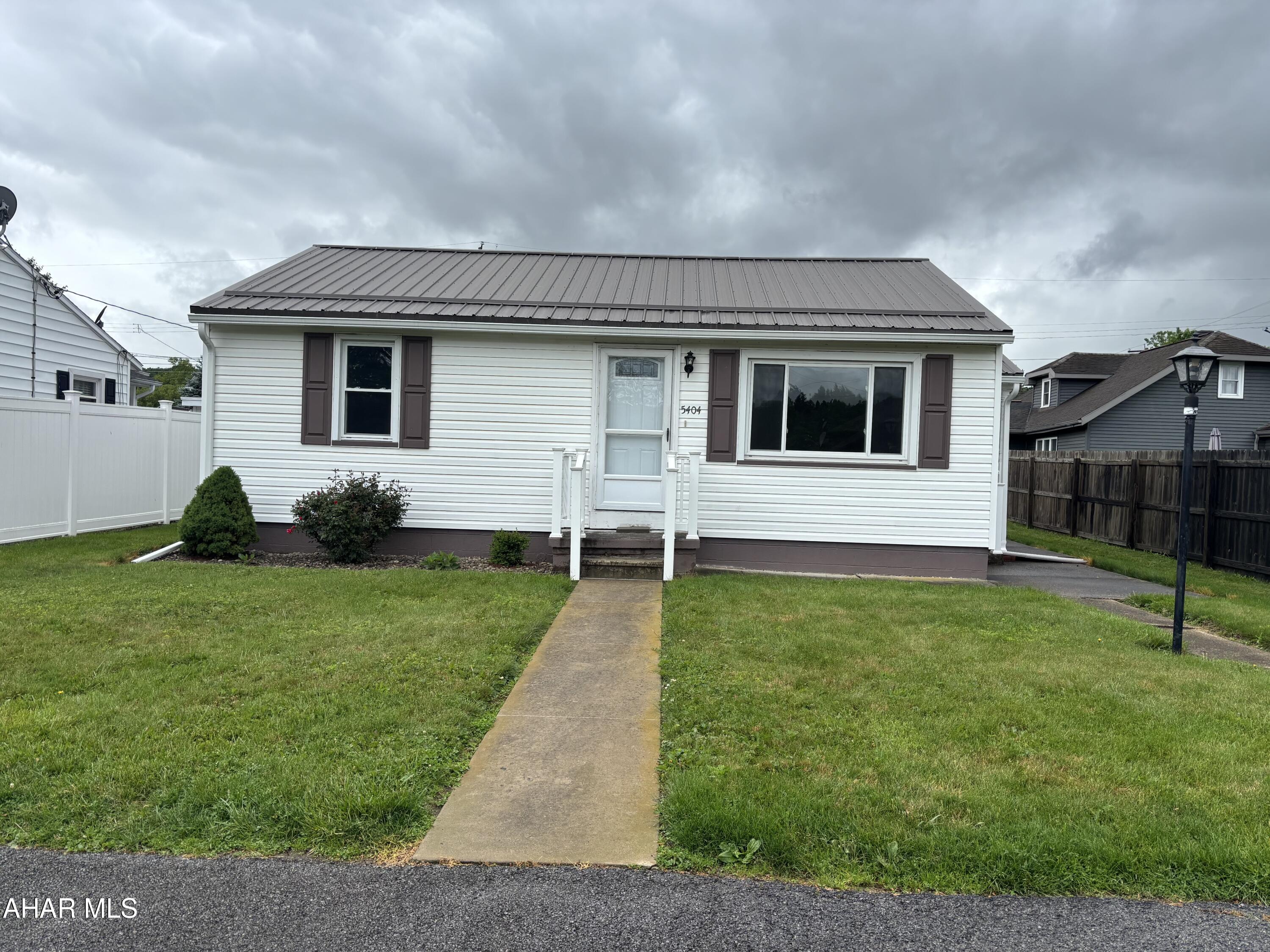 Super cute and clean ranch in a much sought after neighborhood.  Two nice sized bedrooms, newer carpet and flooring, HW under carpet.  Don't miss this one!