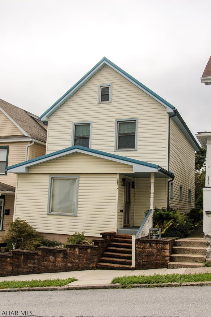 This Altoona home features 3 bedrooms, 2 baths, central air, updated eat-in kitchen, a BRAND NEW finished attic that could be a Master bedroom or family room, HUGE 2 car garage with electric door openers, newer windows and roof. Custom woodwork throughout and much more. It is extremely well kept and move in ready! All surrounded by beautiful landscaping! Call/Text today to schedule your showing!