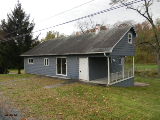 Large 1.5 story home, 4BR/2 full/2 half BA on nearly one acre lot bordering a year-round stream. Featuring both up and downstairs bedrooms, a full unfinished walk-out basement with bath, located in the preferred Snake Spring Valley area. Needs TLC, needs both heat and water systems renewed and purchase AS-IS!