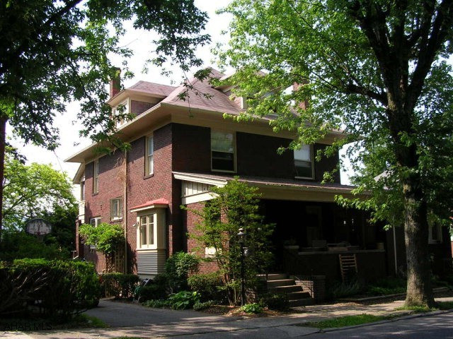 Classic Borough Brick.  Living room with brick fireplace, charming sunroom with fireplace, formal dining room with window seat.  Kitchen remodeled with breakfast bar and pantry.  2nd floor balcony off one of the bedrooms.  Well landscaped yard.  Finished 3rd Floor with Bathroom.  Covered porch off the second floor.