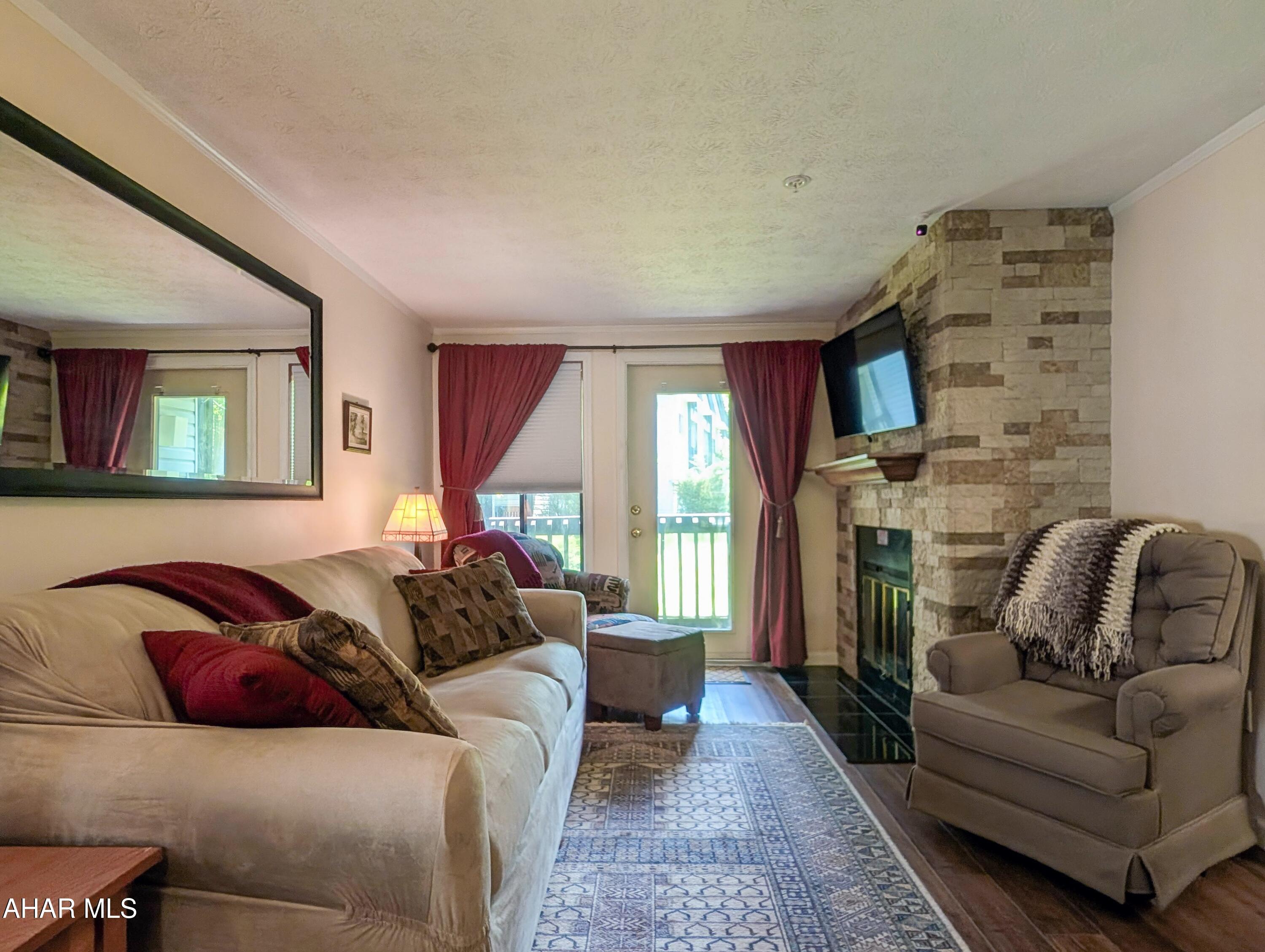 The opportunity is here to purchase a condo in the Allegheny Mountains! Beautifully remodeled first-floor, two-bedroom condo in Blue Knob State Park.  This condo is not like the others.  It is adorned with crown molding, granite countertops, tile backsplash, custom cherry cabinetry with ''soft close'', all new full size appliances, under cabintry lighting, disposal, recessed lighting, modern bathrooms, ceiling fans, full size washer/dryer, full size hot water tank, new wiring, insulated luxury vinyl flooring, smart technology throughout, and so much more.  It is a must see property.  If you are looking for that home feel or a 'home away from home,' this is the perfect condo.  There is nothing they didn't remodel!  Imagine sitting on the porch watching the seasons change, or swimming in the outdoor or indoor pool, playing pickleball, hiking, biking, skiing, and enjoying more mountain adventures.  Just minutes away from everyday amenities, museums, and more.  It is a must see property.  Check back for more photos soon!!!