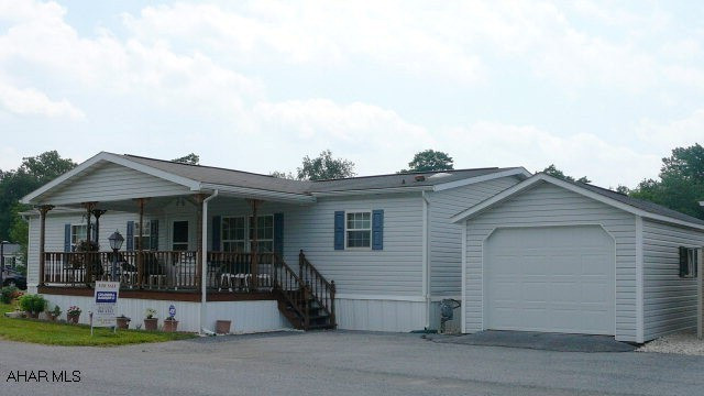 Beautiful manufactured home owned by original owner.  1998 Champion, 32x56 with detached garage.  3 Bedrooms, 2 Bathrooms, Living Room, Dining Room, Laundry Room, Kitchen.  All appliances stay. Must see today!