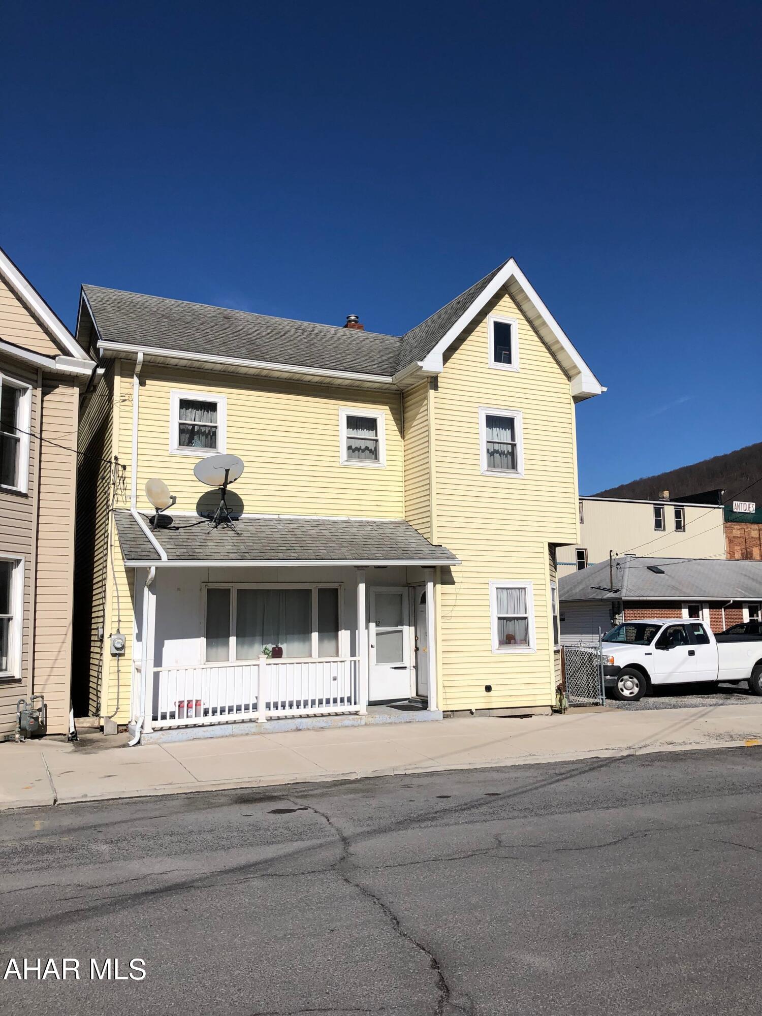 This is a comfortable 4 bedhome that is easy to heat and cool. It has a large bonus room in the rear with its own entrance that could be used for another bedroom , craft room or recreational room. A full bathroom with shower on the first floor makes things convenient and their is also an updated walk in shower on the second floor. There is a small fenced in back yard.Located less than a minute from interstate 99, it has easy access to the State College and Altoona areas. This home is also commercially zoned .