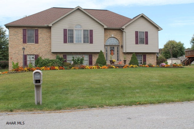 Move Right into this Helsel Development home. Immaculate Split level 3 bed, 3 full bath home offers central air and central vacuum with attachments. Oak trim through out the whole house. The master is spacious with a Walk-in closet and full bath that has Jacuzzi tub and double sinks. The main entrance and living room have a vaulted ceiling that gives the home an open feel and the gorgeous bay window lets in tons of light. Lower Level is fully finished with a huge family room and full bath along with the laundry room and Large closet for storage. Walk out from there to the over sized 2 car garage and utility space. This house has so much to offer for the price!