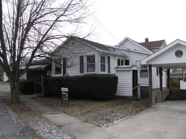 Charming Bellwood ranch on a corner lot! Perfect starter home or down sizer! This 1 bedroom home offers new carpeting and paint thru out. EIK w/appliances, spacious living room, WIC, 1st floor laundry and carport. Maintenance free 1 story living!