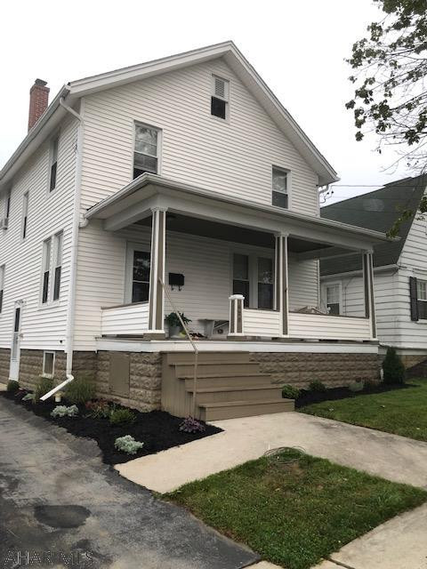Charming three BR home. Nicely updated kitchen and bathroom with beautiful woodwork throughout. Relax and three covered porches and a nice level fenced in backyard. Detached one car garage, off street parking and walking distance to schools and shopping. This won't last long!