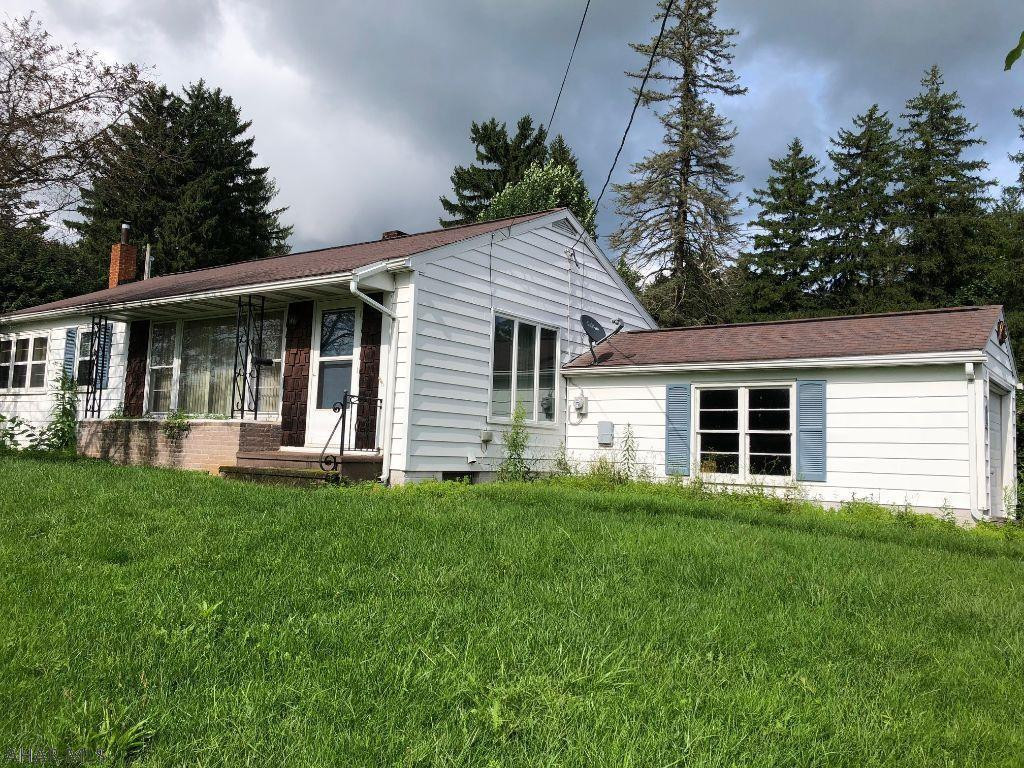 Cozy ranch overlooking Orchard Heights. 2 bedroom, 1 bath, spacious living room with hardwood floors and large picture window, eat in kitchen. Full basement, attached 1 car garage. Sewer is through Bedford Township. Water is through Bedford Borough.