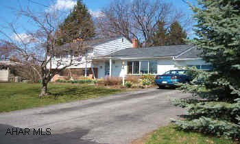 Exceptional Home!  Immaculate Condition.  Very large rooms.  Beautiful family room with fireplace and beveled french doors to a screened in sun porch.  Hardwood under carpet.  Pool 18x32 - new deck with lighting and electricity .  Roof 1998.   Exceptional Home!  Immaculate Condition.  Very large rooms.  Beautiful family room with fireplace and beveled french doors to a screened in sun porch.  Hardwood under carpet.  Pool 18x32 - new deck with lighting and electricity .  Roof 1998.  PLEASE REMOVE SHOES!