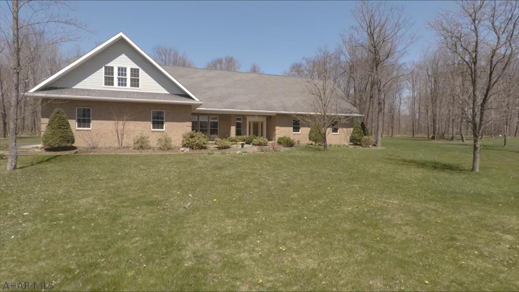 Beautiful 3BR 3 and a half bath home in the prestigious Emerald Estates development of Ebensburg. This home boasts a 3 car garage and radiant heat throughout the first floor. It sits on a lovely, semi private 1.3 acre flat lot with lush landscaping. First floor master with spacious master bath, separate shower and soaking tub. Hardwood floors, first floor laundry and a huge bonus room upstairs that can be finished to your needs as a theater room, game room or an additional master suite.  So many possibilities! *Taxes are estimated.
