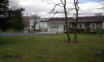 WALK TO GAME LANDS! GREAT RESI  AND/OR COMMERCIAL. CALL TO CONFIRM. 4 BR RANCH ON 1.19 ACRE. 1 CAR ATTACHED GARAGE. 9 CAR (6000 SQ FT) 2 STORY DETACHED W/WOODSHOP. 2 SEPARATE DEEDED LOTS SOLD TOGETHER. EFFICIENT HEAT, LEVEL LOT. HOT TUB, MORE! NICE LEVEL 1.19 ACRE FENCED LOT WITH 4 BEDROOM RANCH & DETACHED 9 CAR GARAGE & WOODSHOP ON OWN DEEDED LOT. HOME HAS NEWER CARPET, 2 FIREPLACES, 3 HEAT SYSTEMS & MORE! WALK TO STATE GAME LANDS. OWNER MAY RENT BACK GARAGE UNTIL EQUIPMENT REMOVED.   CALL DARLA 696-1227 OR 934-4663.