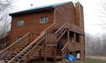 GORGEOUS BLUE KNOB CONDO WITH HUGE LOFT, BEAUTIFUL HARDWOOD AND TILE FLOORS. REMODELED BATHROOM, REBUILT ATRIUM. 3 MILES FROM SKI SLOPES! ASSOCIATION DUES $196 INCLUDES WATER/SEWER/TRASH/ EXT. MAINTENANCE/SNOW REMOVAL/OUTSIDE ELECTRIC.