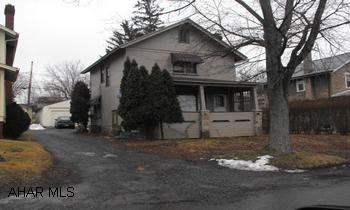 3BR home on double fenced  lot.  Oversized one-car detached garage.  Gas fireplace in living room.  Central air.  Needs work.  Agents - this is a shared driveway - please don't park on other side when showing.