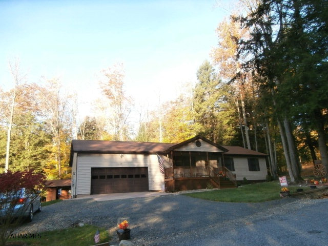 Beautiful stick built home on landscaped lot. 2x6 wall framing, vaulted ceilings, central air, sunken family room, master bath, oversized attached garage with added storage, rear patio with fireplace, outside man cave, very clean and well maintained home