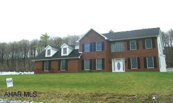 VIEW IS GORGEOUS. BACK BORDERS THE WOODS FOR LOADS OF PRIVACY. F.R. HAS A FP. BASEMENT IS FINISHED OFFERING LARGE FR W/RECESSED LIGHTING & WET BAR. LARGE BR, 1/2  BATH. STORAGE AREA. ATTIC COULD BE FINISHED FOR BEDROOM. WELL MAINTAINED.