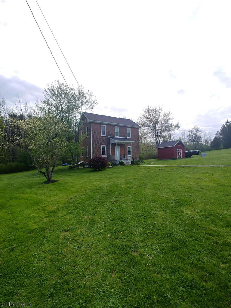 Beautifully updated 3 bedroom 1.5 bath Hollidaysburg School district. This home has beautiful original wood work and flooring with modern charm. The tall ceilings throughout are just an added bonus. The recently added half bath on the first floor is very convenient . The updated kitchen has an island with the sink and lots of storage space. The second floor features hardwood flooring, 3 bedrooms, a large bathroom, and 2nd floor laundry/office space. The outside areas of the home are perfect for entertaining. Call listing agent for more information and your private tour today!