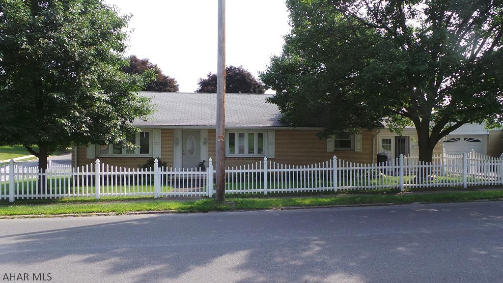 Needs a little TLC, but good size rooms, oversized 1 car garage.  Sold AS IS.
