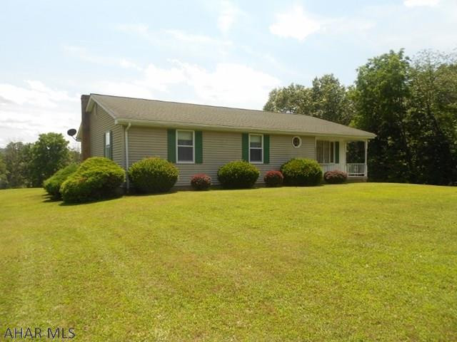 Privacy, wildlife, abundant garage space, spacious yard, wooded area in rear of property with a stream. This ranch home has 11.67 acres, outbuildings and parking inside for over 6 cars. Inside has nice size rooms with lots of potential. 2 bedrooms on main level, extra bedrooms could be added in basement. 3 bathrooms, views and paved driveway, very close to Rt 68 to Hancock or Cumberland. Come take a look at this inviting property!!