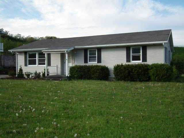 Good Location - Lg. Yard, Covered Patio All For Your Family; Summer Fun - This Home Offers Laminate & Carpeted Floors, Lg. Living Room, Dining Area With A Great View Of Back Yard - Call Today For Your Showing!