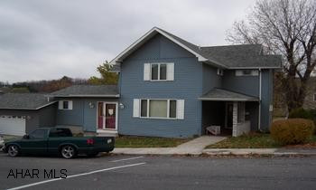 Exceptional!! LARGE rooms throughout. Oak kitchen cabintry/ dining area,livingroom, front entrance w/ closet, huge master BR., w/ master bath, 3 other BR., one with bath and full bath, laundry room on second floor, nice big storage attic, rustic family room in the basement, two car attached garage with storage, Quality construction throughout with oak trim. A must see to appreciate.