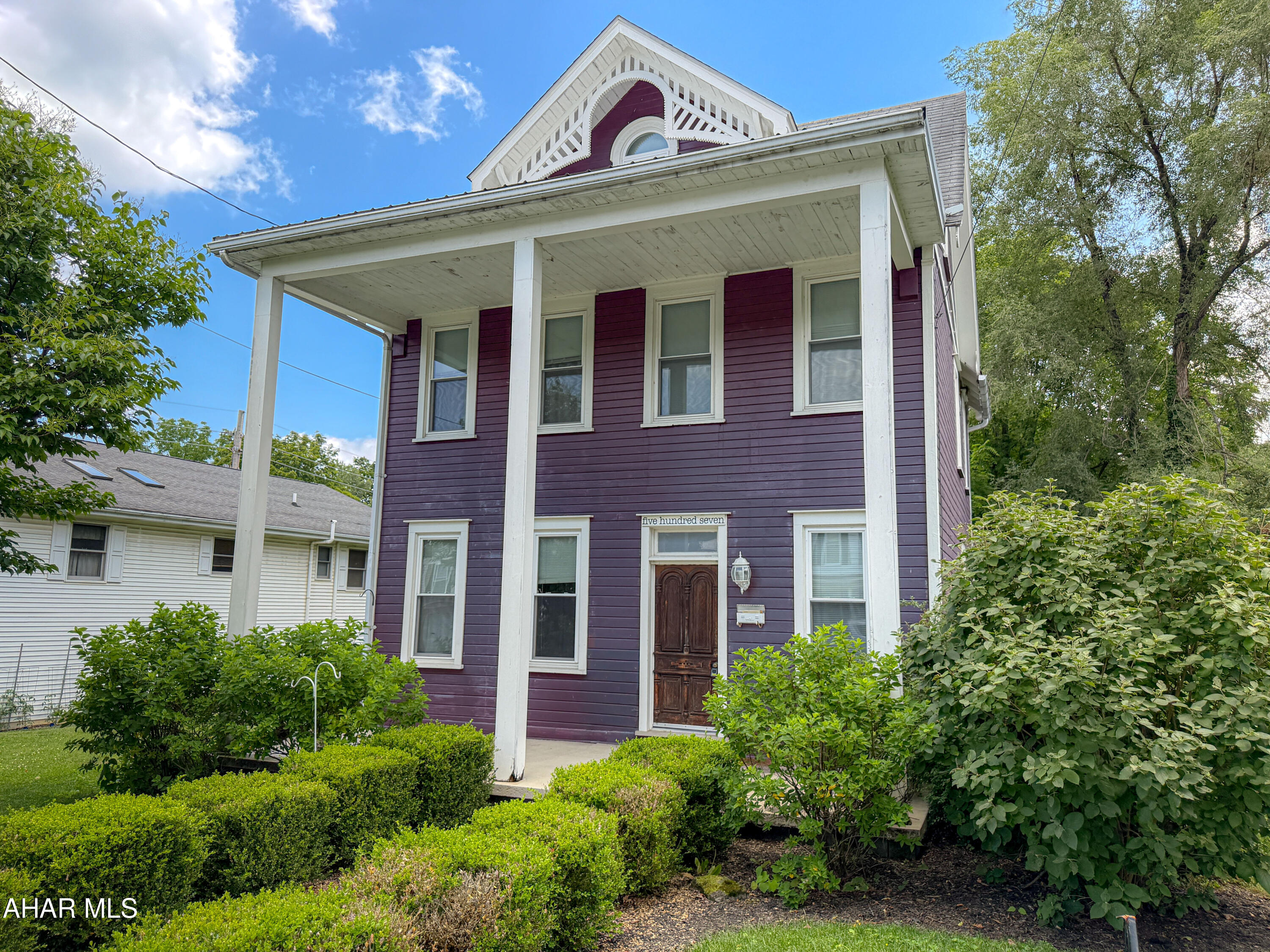 Welcome Home!  This charming 2-story Colonial offers 1792 sqft of timeless character and comfortable living.  Featuring beautiful cherry hardwood floors in the light, spacious living room and again in the darker traditional dining room - even the kitchen!  The clean, simple kitchen with maple cabinets is open with ample room for eat-in or a breakfast nook.  
There are 3 well-proportioned bedrooms upstairs - each unique in style and design. The completely finished third level presents as the third bedroom with plenty of space to add an office area, sitting room, maybe another bath?
This home blends classic design with thoughtful updates, including a beautifully remodeled bathroom.  A true retreat, complete with modern oversized shower and a luxurious soaker tub, perfect for unwinding at the end of the day.
Full walkout basement with high ceilings, laundry area, and lots of storage space.
Outdoors, enjoy entertaining or relaxing in the pavilion with covered patio.  The fire pit creates an inviting space for gatherings in every season.
A wonderful opportunity to own a home that combines traditional Colonial style with modern comfort.