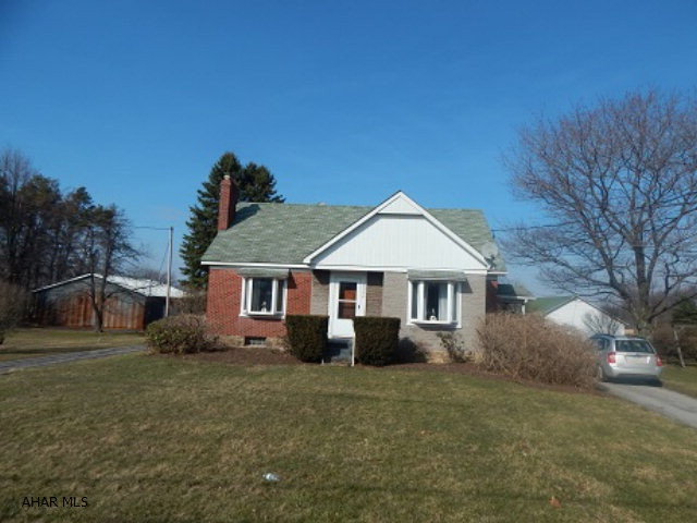 Don't miss the Possibilities!!! ----25+ acres, wildlife abounds!!  Brick and Stone 3 bedroom home, wood floors, spacious basement, 4 car garage, small gentleman dairy farm, pole building/machine shop!! Ask agent for detail sheet