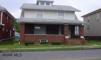 3rd Floor semi-finished for storage, workshop, full bath in basement, front and back porch, 2 car garage, GHW heat, large kitchen.