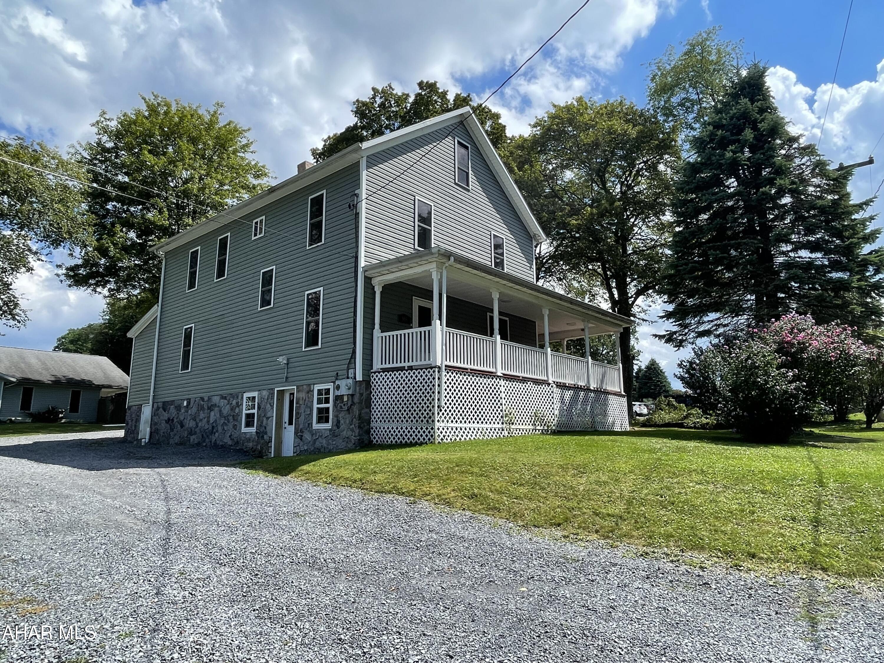 Looking for a large home for your family? You will want to see this 5 bedroom 2 bath home on large lot in Cresson Township with all that Veteran''s Park has to offer right in your backyard!  This home has been completely renovated inside with new drywall, floors, lighting, windows, updated baths, and a completely renovated kitchen that includes brand new appliances!  Step inside this bright and airy home and see the updated bath, the eat in kitchen and a massive kitchen ing room that can accommodate a large sectional and a massive tv for football games this fall.  There is an additional room that can be an extension to the living room/family room or have a designated dining room.  The large foyer is the perfect place for coats and shoes or even a place for an office area.  Upstairs you will find 5 bedrooms, yes 5 and a renovated full bath.  The walk up attic is spacious and could be finished or simply use it for storage.  The basement is where you will find the laundry hookups.  There is plenty of room for all your family to park with pass through driveway.  Call today!