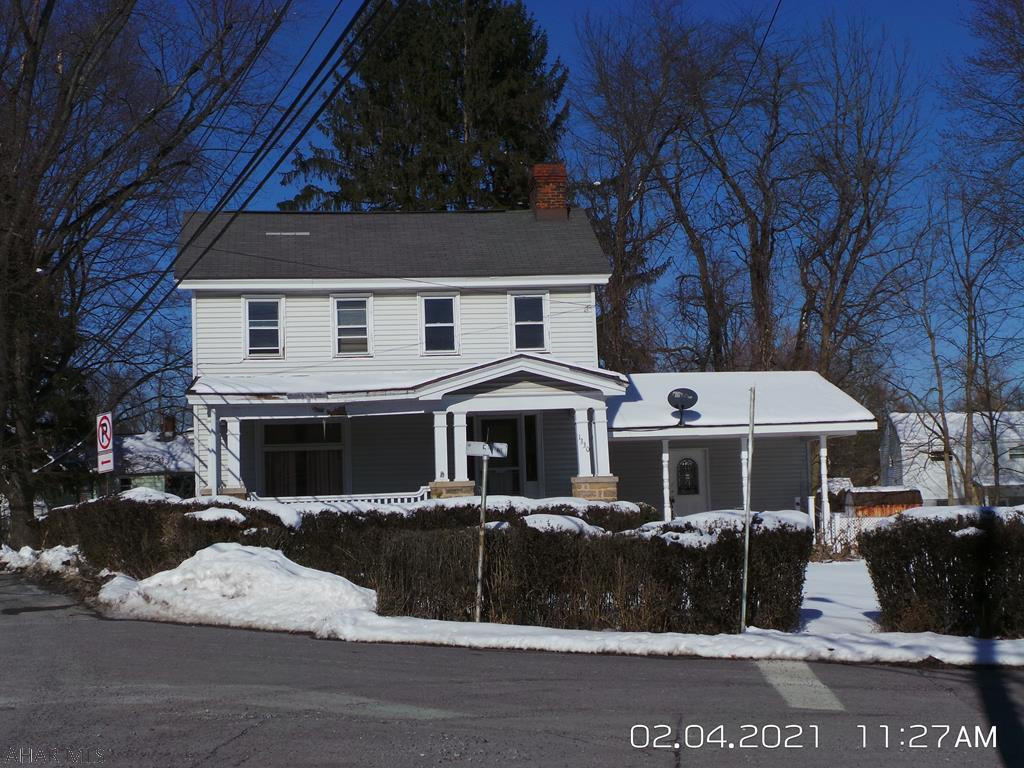 LARGE, flat corner lot in Duncansville Boro with off street parking.  Propane heater in Bonus Room. Property being sold "AS IS".  Needs some work, but has good potential.  Survey map in docs.  Property not in flood plain.