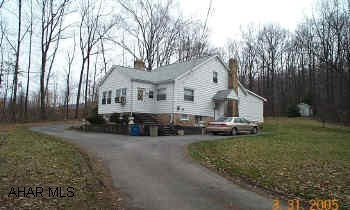 2 BR home near Logan Town Center. Could be great rental-Zoned Commercial.