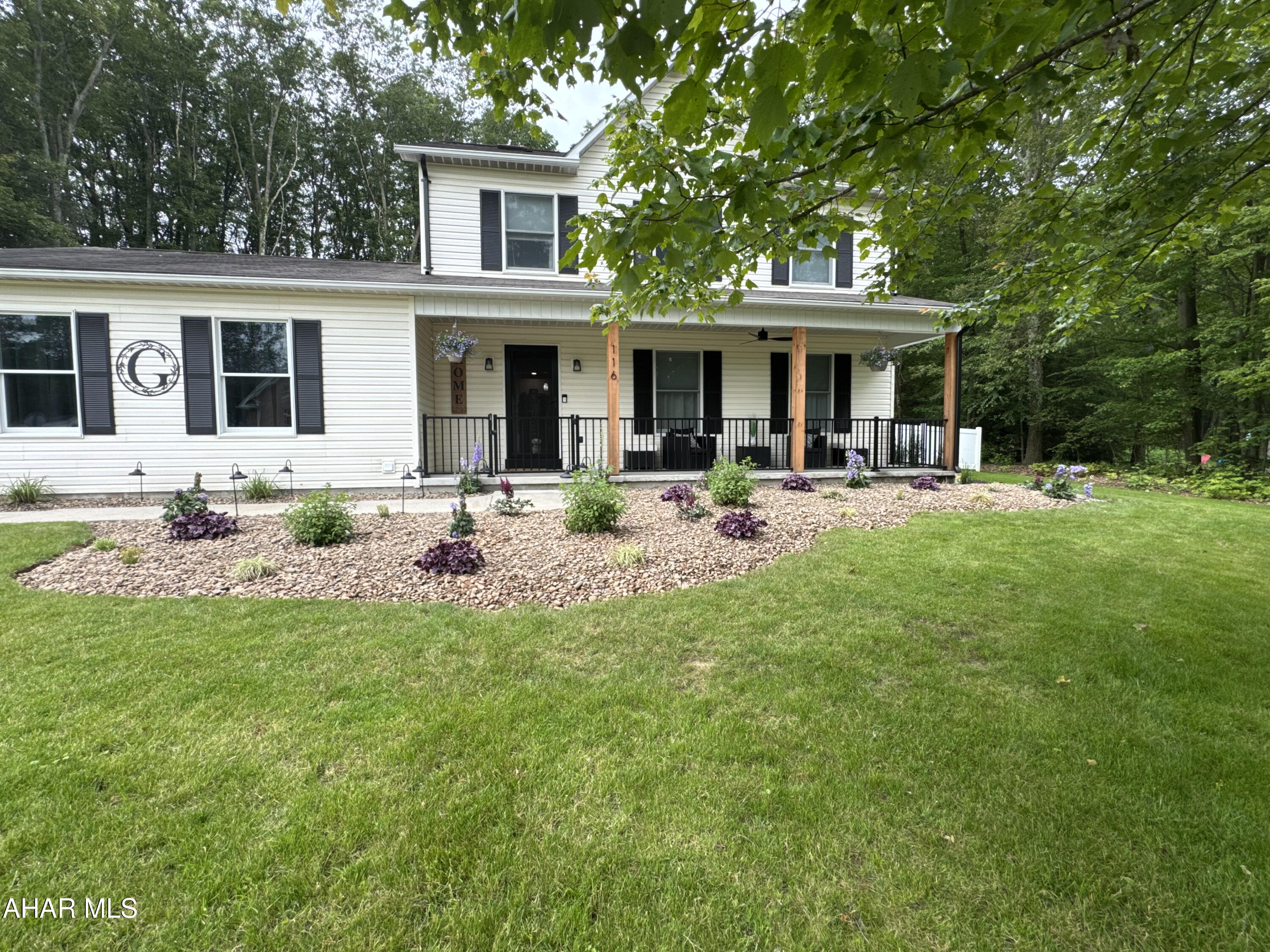 Welcome home to comfort, style and space.  Step inside this beautiful 4-bedroom, 2.5 bath home featuring a warm and inviting open floor plan designed for everyday living and effortless entertaining.  The spacious living room is perfect for gathering with family and friends, while the first floor bedroom and full bath adds flexibility for guests or multi-generational living. The heart of the home is the stunning kitchen, complete with granite countertops, abundant counter space, and a  large pantry. The kitchen flows out to a 10x28 Trex deck where you can relax, unwind or host unforgettable get togethers and also a large front porch for out door enjoyment.   Upstairs you'll find a large bathroom featuring a soaking tub, and a beautiful vanity.  Additional features you'll love are central air for year round comfort, new doors throughout, 2 car attached garage,  and a fenced in back yard offering privacy and piece of mind.  This home has a perfect blend of charm, modern  updates and livable space.  Come experience for yourself.