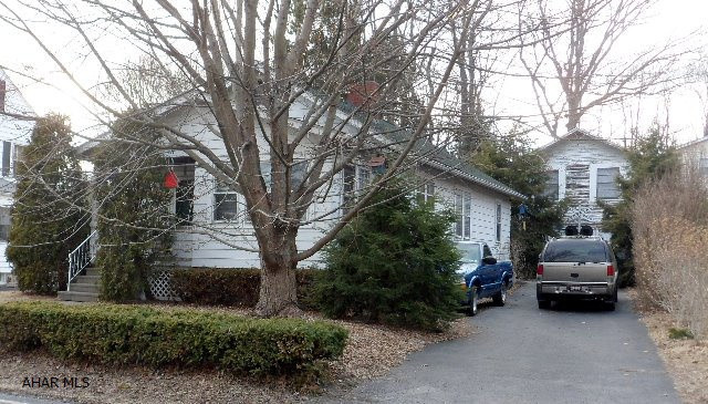 Cozy One Story - 5704 California Ave. - 2 BR, 1 BA, living room with fireplace and sunroom offset, formal dining room with corner cupboard, step saving kitchen with appliances, full basement includes washer, dryer, and pellet stove, 1-car garage has 2nd floor storage, private driveway, lot 51 x 120, partially fenced yard with pussy willows, cherry and apple trees. Updates include: New furnace, roof 2004, some new tilt windows, blown fiberglass insulation in walls 1998, driveway paved 2009. Sold AS IS $69,900.
