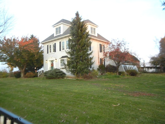 Refurbished farm house offers plenty of space for the large family. Family room has brick wall with woodburner and built-in bookcases. Sunroom w/brick floor and shatter resistant glass, first floor laundry w/half bath, oak kitchen w/pull out pantry, built-in desk, reverse osmosis at sink. Third floor bedroom w/full bath and walk in closet. Master bedroom w/bath and walk in closet. Tile entranceway with leaded glass door. Replacement windows and geo thermal heating/cooling. Includes 2 story barn w/3 bays, loading bay, corn crib, tractor and hay storage. Silo, stable 2/6 stalls and office, shed w/elec, goat house w/fenced pasture, chicken house, elec fenced pasture, inground pool (not used), fruit trees, grape arbor, garden area. New water line. Two wells. Black metal fence around house.