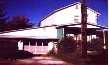 2 bedroom home with large fenced in lot, 2-car garage with workshop. 2 bedroom home with large fenced in lot, 2-car garage with workshop.