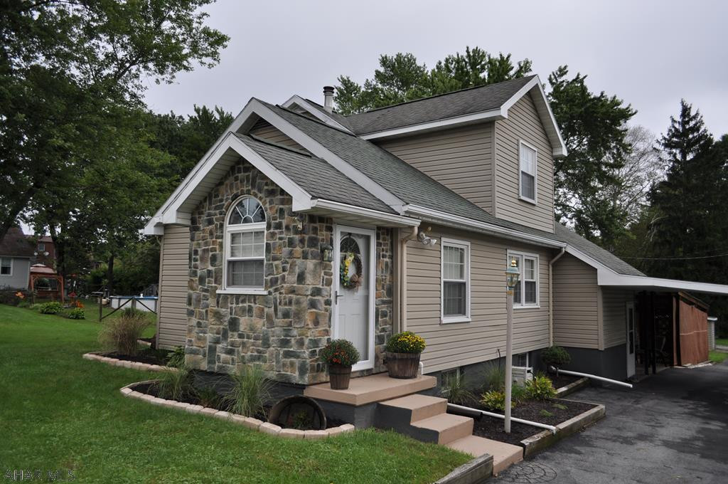 Beautifully maintained and updated 4 bedroom 2 bath home in Hollidaysburg Area School District. This home is move-in ready featuring cathedral ceilings in the living room, beautiful newly refinished hardwood flooring through the living room, dining room & kitchen, and a great cemented outdoor entertainment area with pergola, string lights, & lattice work next to a large flat yard with 2 sheds. The kitchen is completely updated with all stainless steel appliances and a new custom-made kitchen island included. The upstairs bedroom features vaulted ceilings and the master bedroom features newly installed luxury vinyl flooring, trim, and a custom-made wood wall. Home also features a whole-house generator.