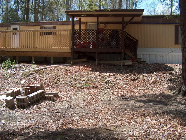 Great starter home or get-away. New plumbing, new decks, new carpet