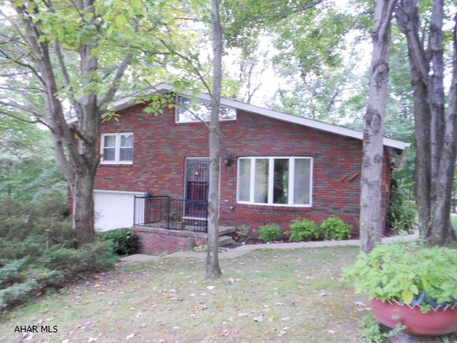 1 story brick home on a great lot. Newer roof, windows, furnace, electrical. Property has 2 bedrooms & 2 baths with finished basement, attached & detached garage. Great lot in a great location. Seller had the property connected to public sewer. Interior needs very little TLC. This is a well built home looking for you to make the move with your offer. Motivated Seller. Sell is offering interior painting credit. Make your offer today.