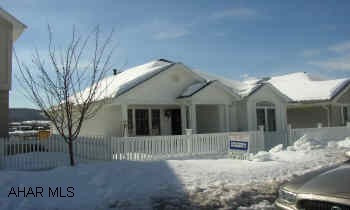 CHARMING COTTAGE!  2 BEDROOM, 2.5 BATH, FINISHED BASEMENT, 1 CAR ATTACHED GARAGE.  EASY LIVING IN THIS MAINTENANCE FREE 1 STORY HOME.  MANY UPGRADES.  FANTASTIC VIEW FROM PATIO.