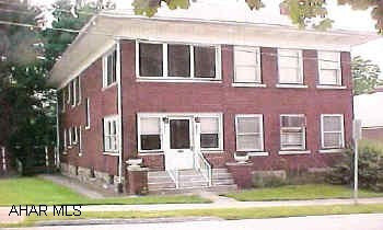 Great brick duplex in good area. Large LRM. Formal dining rm. Eat-in Kit. 2BRs & 1 full bath on each level. Both units also have sunrooms. One gas hot water furnace. Separate utilities. 2-car detached garage. Good property! Great brick duplex in good area. Large LRM. Formal dining rm. Eat-in Kit. 2BRs & 1 full bath on each level. Both units also have sunrooms. One gas hot water furnace. Separate utilities. 2-car detached garage. Good property!