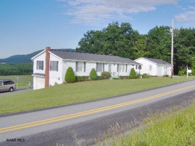 Very well maintained ranch house on 1 acre with awesome views. 3 Bedrooms and 1 3/4 baths, full finished basement with additional kitchen. 1-car integral garage and 2-car detached garage.