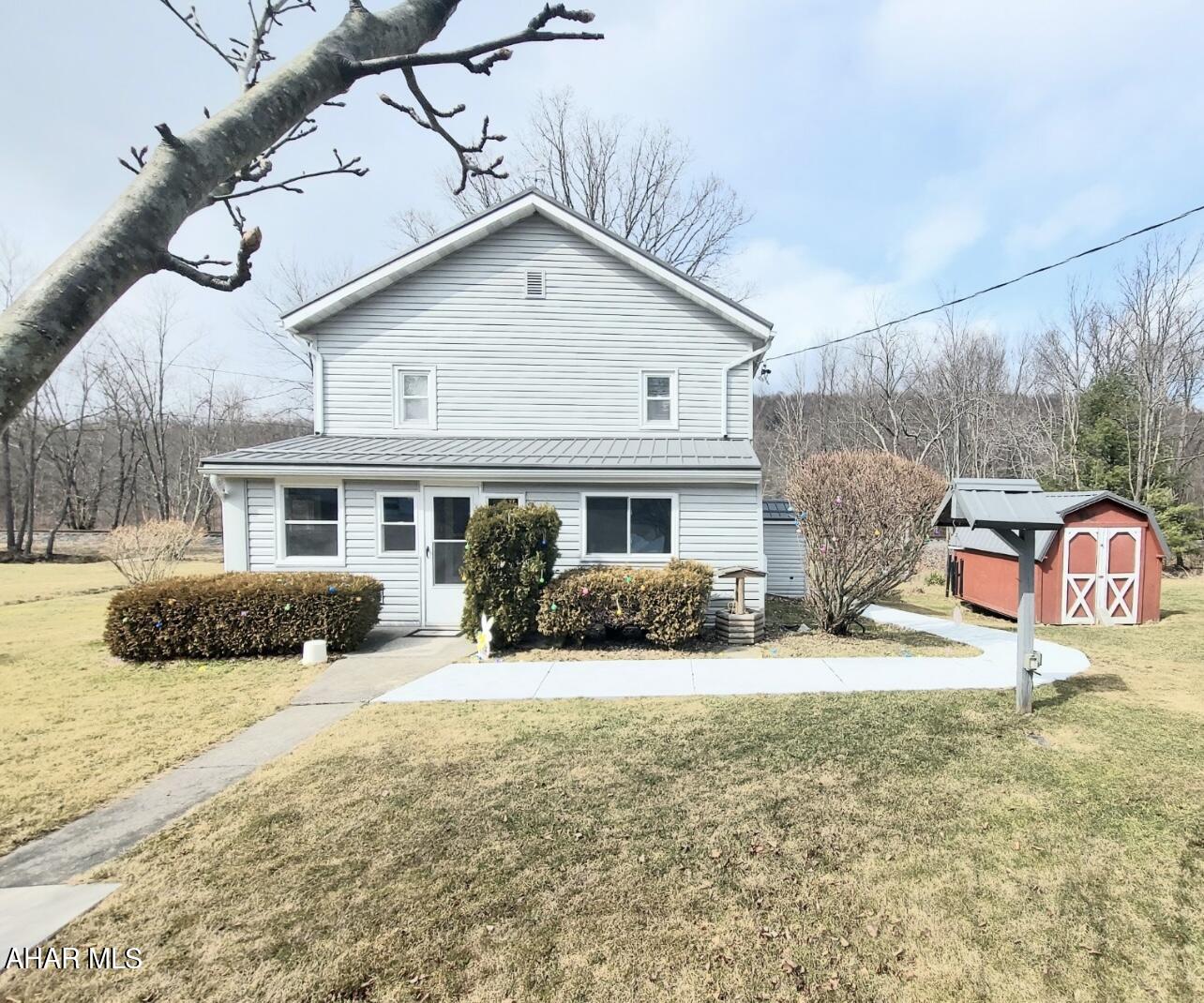 Check out this beautiful 3 bedroom, 1 1/2 bath two story on almost an acre. This accentuates country living at its finest. Home features newer roof. Shed and garage for storage as well as a workshop. Priced to sell