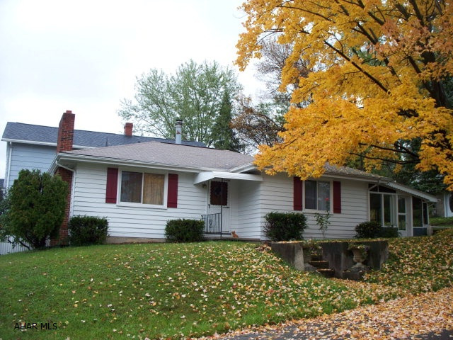 New vinyl windows, good quailty furnace. Attractive hardwood floors. Brick fireplace in living room and basement family room. Screened in porch. Storage shed.